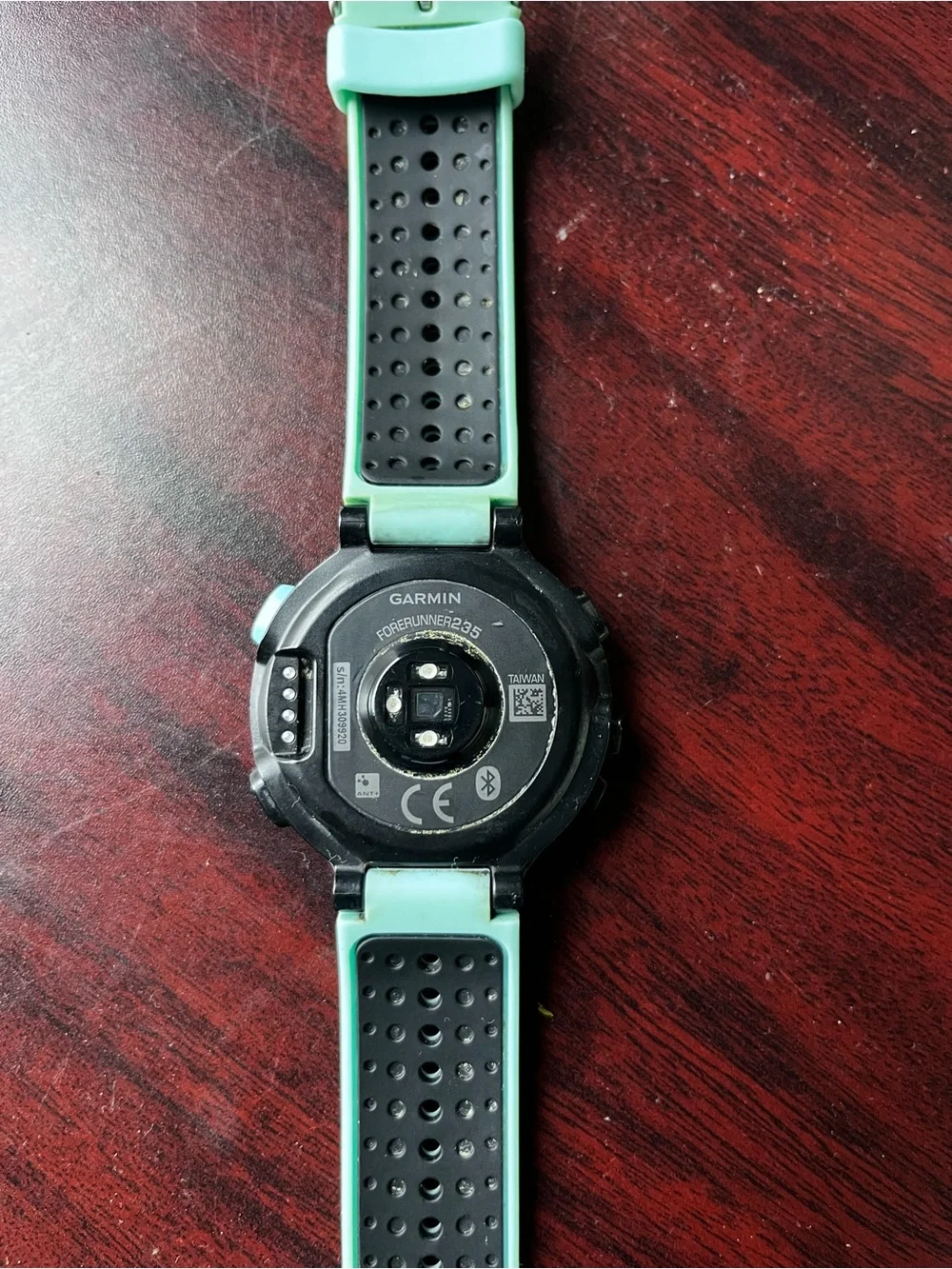 Garmin 235 Forerunner Smartwatch with Mint Green Perforated Band